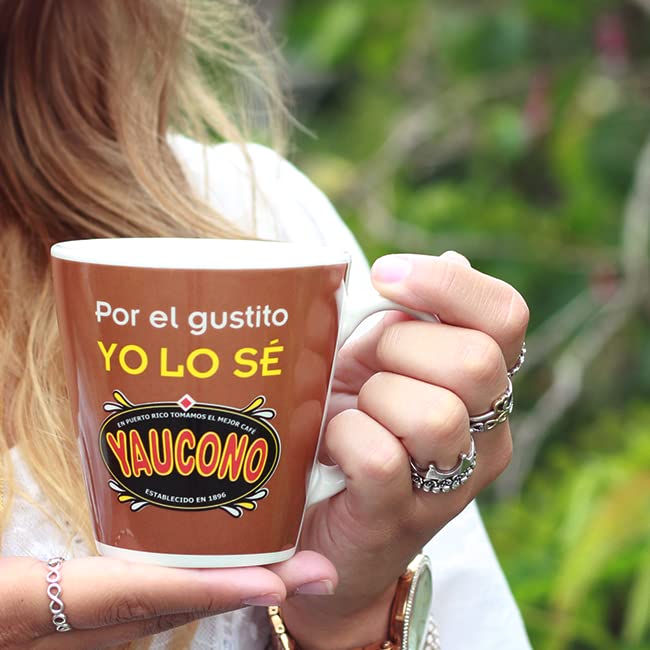 Yaucono Dark Roast coffee beans close-up emphasizing 100% Arabica quality.