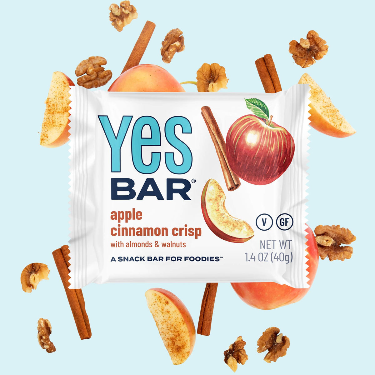 The YES Bar Apple Cinnamon ingredients photo shows almonds, cashews, and maple sweetness.