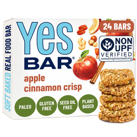 The YES Bar Apple Cinnamon soft-chew bar texture indicates a satisfying snack.