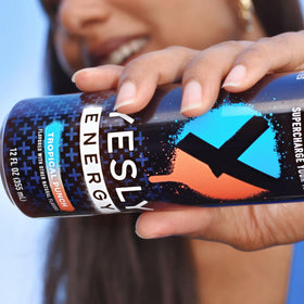 Yesly Energy Tropical Punch over ice for a crisp, refreshing bite