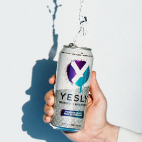 Yesly 12-pack carton shown for convenient multi-pack hydration at home or work.