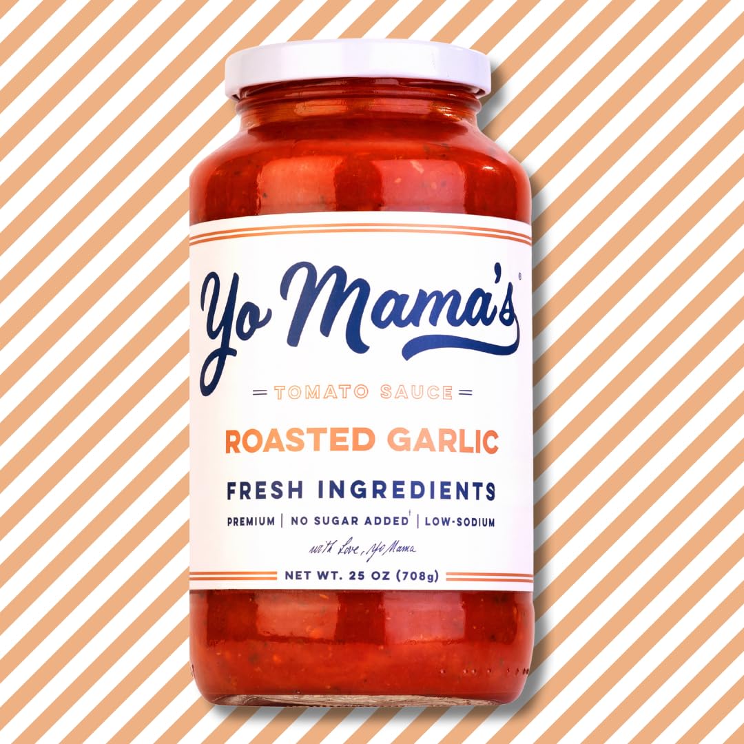 Yo Mama’s Foods keto sauce being poured over pasta for low-carb dinners