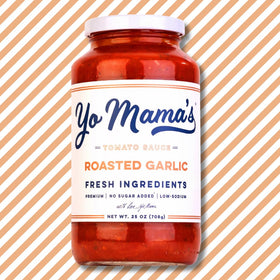 Yo Mama’s Foods keto sauce being poured over pasta for low-carb dinners