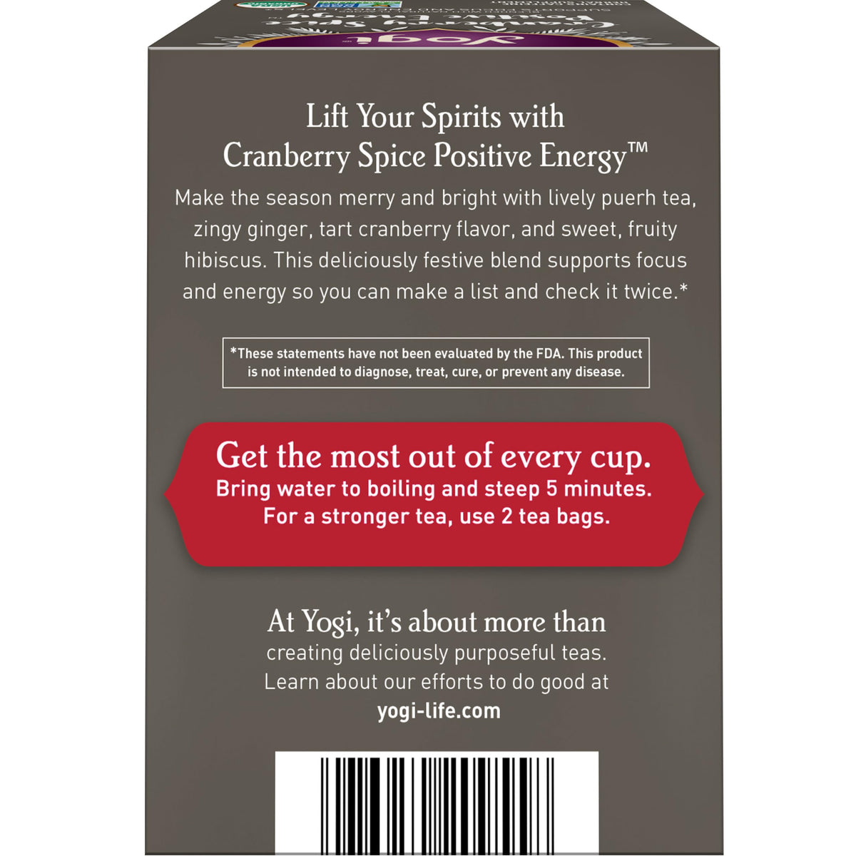 Steaming cup of Yogi Cranberry Spice Positive Energy tea highlighting aroma and flavor.