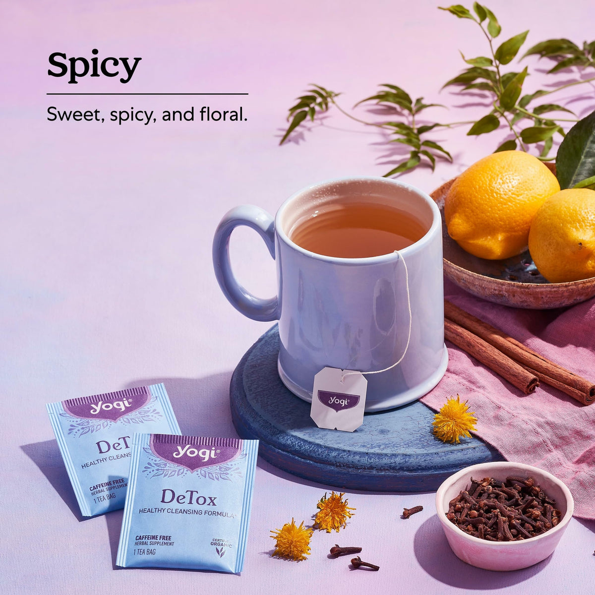 Steam rises from a cup of Yogi DeTox tea with inviting aroma.