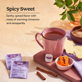 Yogi Kava Stress Relief Tea brewed cup with steam and warm glow.