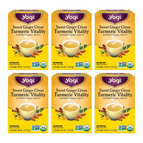 Yogi Sweet Ginger Citrus Turmeric Vitality tea bag in cup with bright aroma