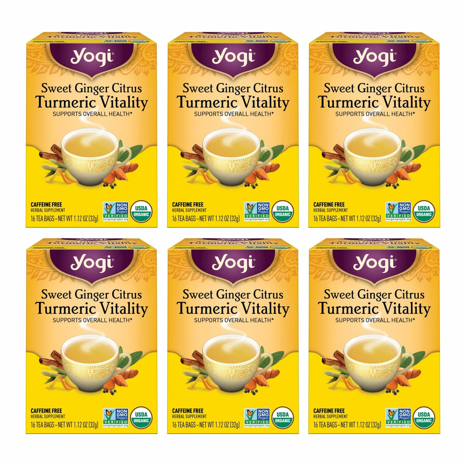Yogi Sweet Ginger Citrus Turmeric Vitality tea bag in cup with bright aroma