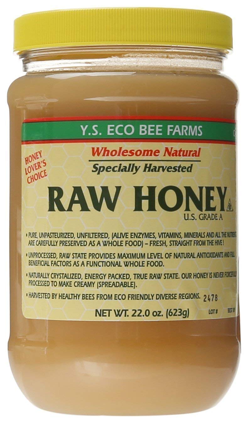 YS Organic Bee Farms Raw Honey bottle ready to drizzle on toast for natural sweetness
