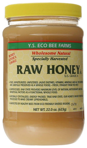 YS Organic Bee Farms Raw Honey bottle ready to drizzle on toast for natural sweetness