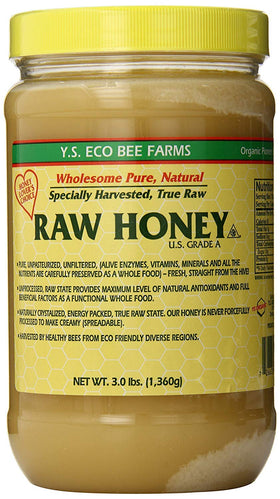 YS Eco Bee Farms RAW HONEY 3lb jar in golden amber, ideal for tea and toast.