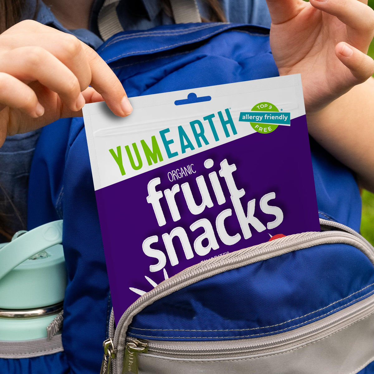 YumEarth allergen-free gluten-free vegan badge communicates inclusive snacking.