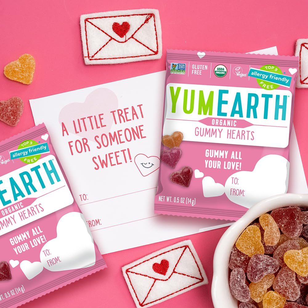 YumEarth peach-flavor gummy hearts close-up, vibrant color and tasty snack