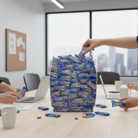 Crisp almond pieces and smooth milk chocolate in AlmondJoy by Yummy Chew.