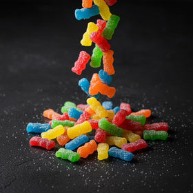 Yummy Chew SourPatch Kids assorted fruit flavors arranged for color displays on dessert tables.