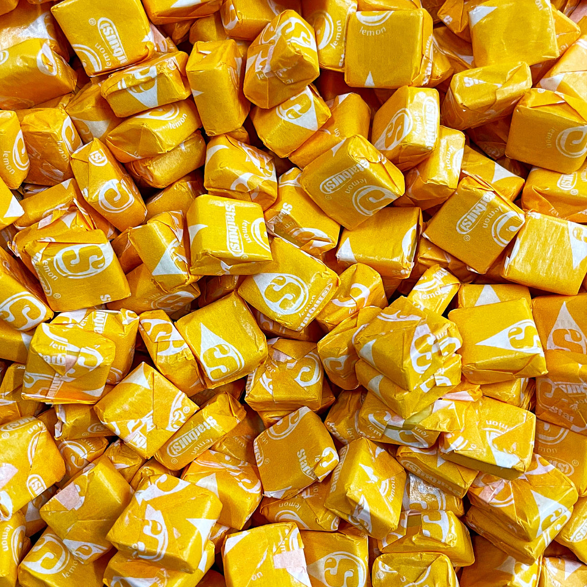YUMMYLAND Star Bursts Lemon Candy Pack showcases glossy yellow chews for a refreshing citrus bite.