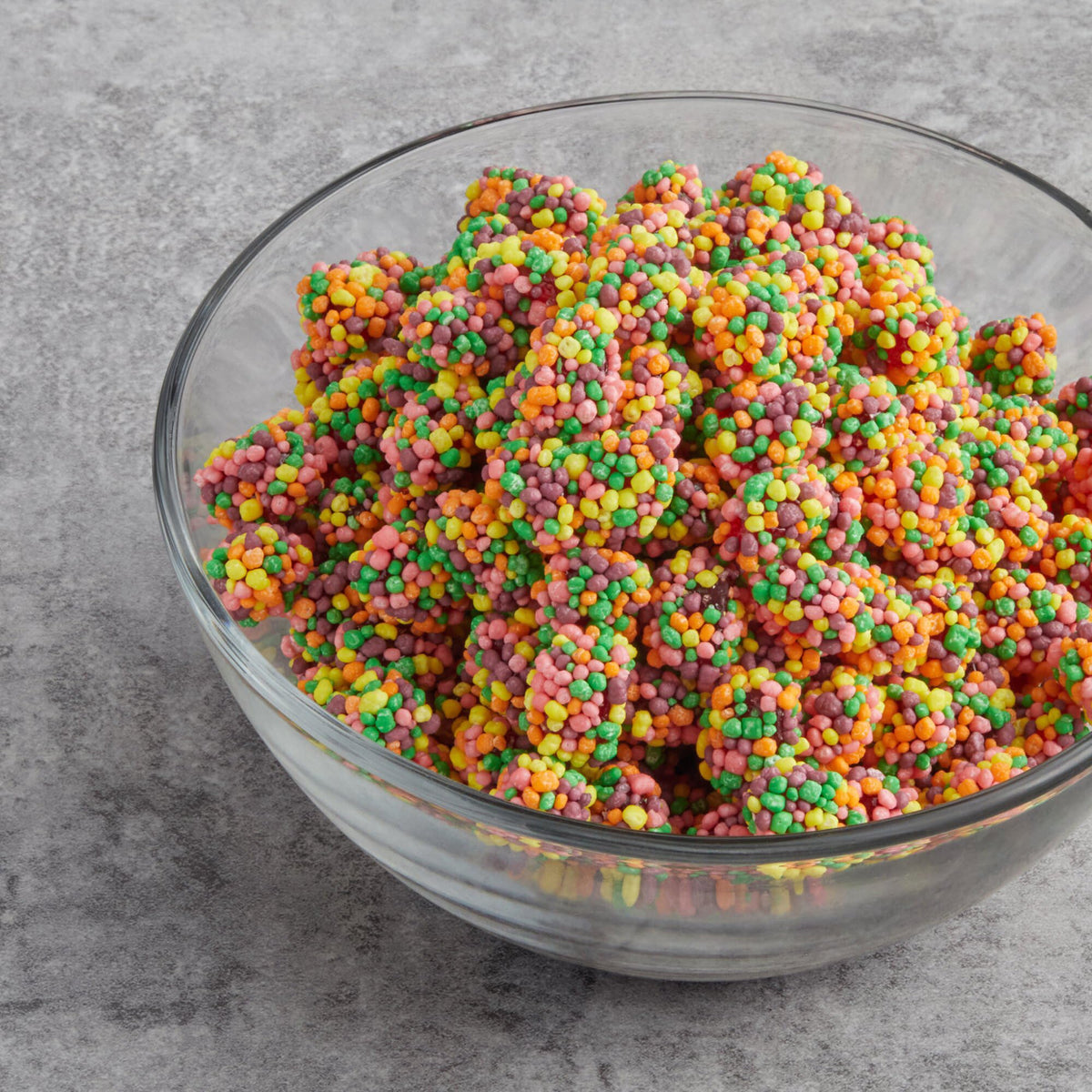 YUMTOV Rainbow Gummy Clusters close-up showing chewy center and crunchy outer layer.