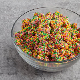 YUMTOV Rainbow Gummy Clusters close-up showing chewy center and crunchy outer layer.