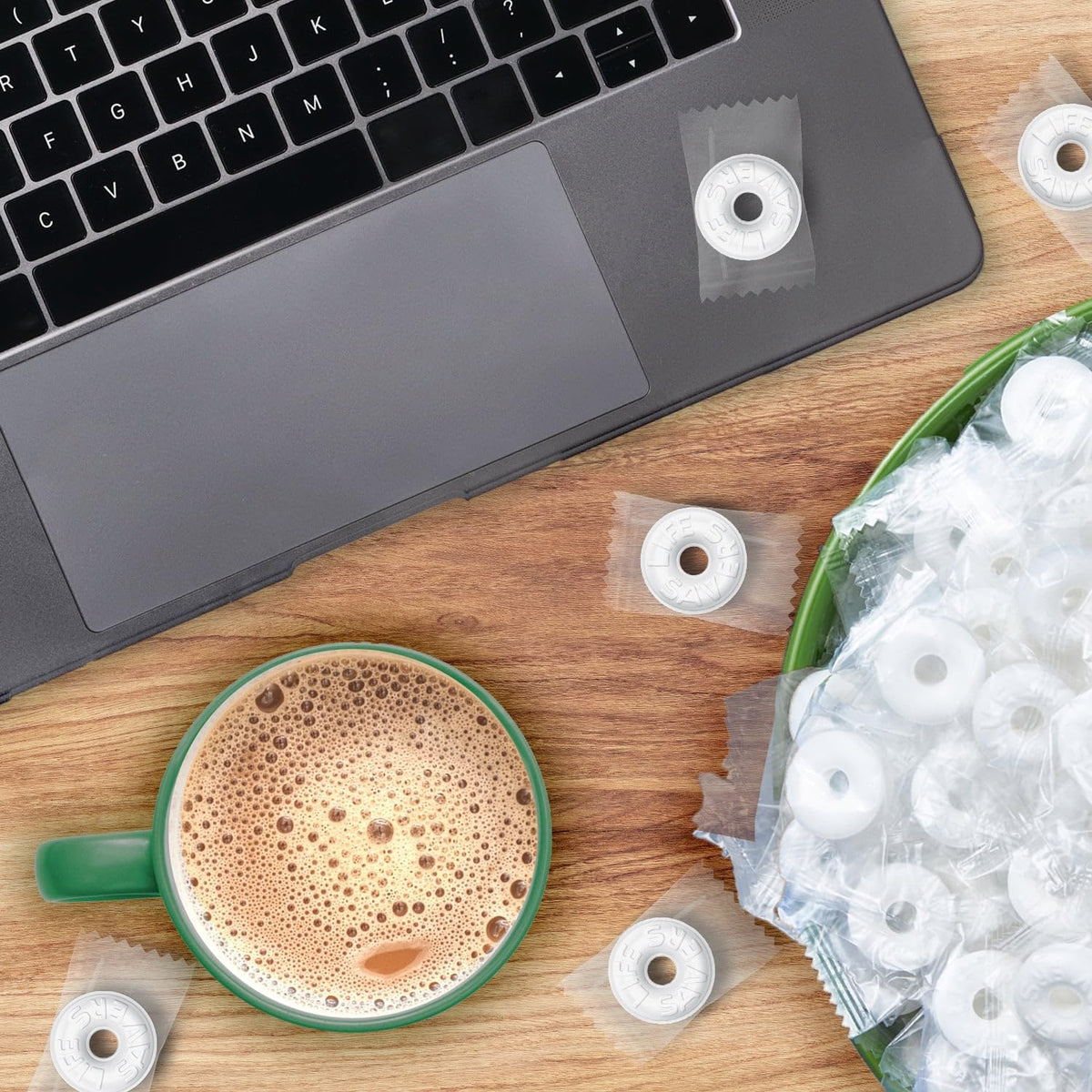 YUMTOV Wint-O-Green mints arranged in a bowl on a desk for office breaks.