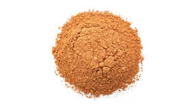 Yupik alkalized cocoa powder in canister ideal for baking and beverages.