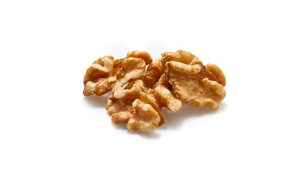 Yupik walnuts halves in a bowl, ideal for topping salads.