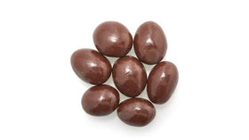 Yupik dark chocolate coconut almonds bite close-up, rich flavor with crunchy roasted nuts.