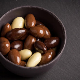 Yupik dark chocolate coconut almonds foil pack, kosher certified snack option.