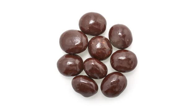 Close-up of glossy 60% cacao coating on whole coffee beans.