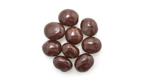 Close-up of glossy 60% cacao coating on whole coffee beans.