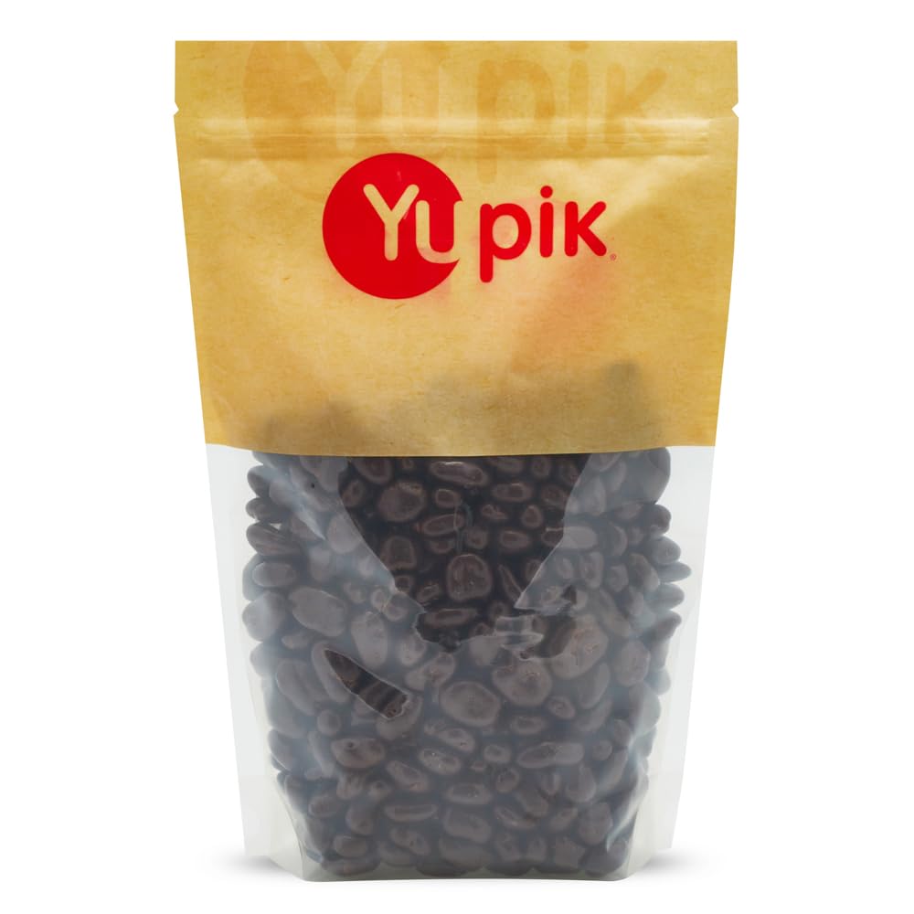 Yupik dark chocolate pecans close-up with 60% cacao coating for rich snacking.