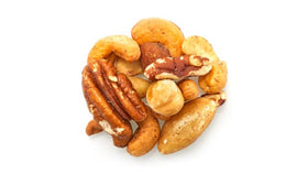 Yupik Deluxe roasted unsalted nut mix on a wooden board, ready for toppings.