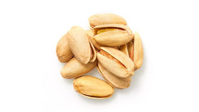 Yupik pistachios in-shell close-up shows vibrant green kernels ready to shell and enjoy.