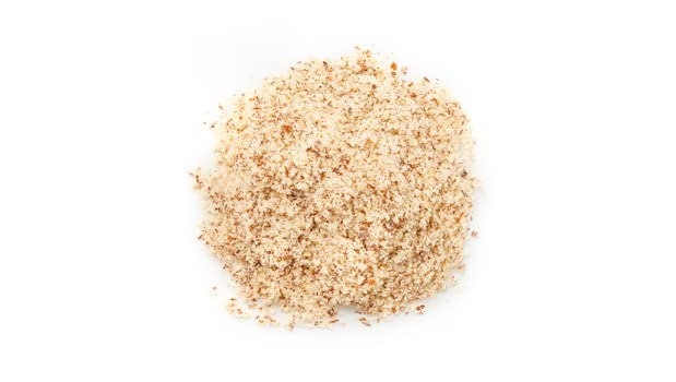 Yupik almond powder in a bowl enhances versatile, dairy-free recipes.