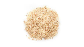Yupik almond powder in a bowl enhances versatile, dairy-free recipes.