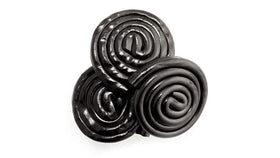 Yupik licorice rolls chewy texture close-up highlights organic candy