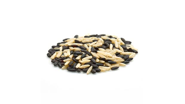Cooked Yupik Organic Ancient Black Rice Mix makes a fiber-rich side or salad base.
