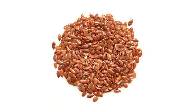 Yupik flax seeds closeup brown seeds rich in fiber and plant-based protein.