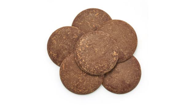 Yupik Organic Cocoa Liquor Wafers thin discs close-up; melt easily for silky textures.