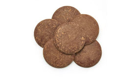 Yupik Organic Cocoa Liquor Wafers thin discs close-up; melt easily for silky textures.