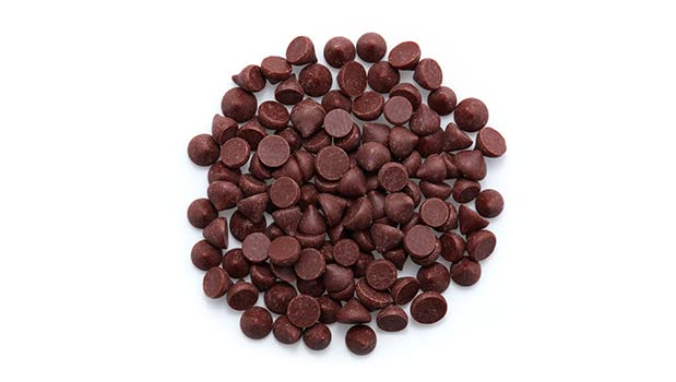 Close-up of Yupik 70% chocolate chips highlighting rich cacao flavor.