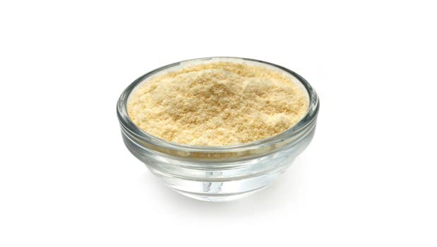Yupik millet flour pouring into bowl for gluten-free cooking