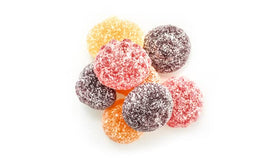 Yupik Organic Sour Gummy Mix variety fruits on a platter highlight versatile, shareable treats.