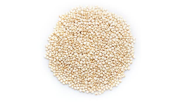 Yupik Organic White Quinoa cooking in pot with steam, fluffy texture ideal for bowls.