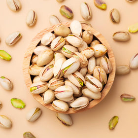 Yupik salted pistachios in-shell shot emphasizes light seasoning for versatile munching.