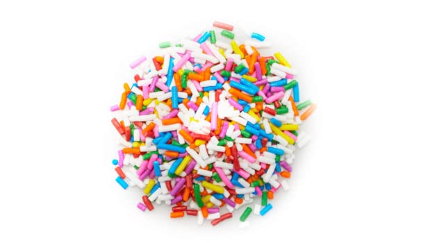 Yupik Rainbow Sprinkles on cake add color and texture for celebrations.