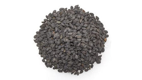Yupik raw black sesame seeds in measuring cup perfect as a topping