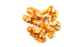 Close-up of Yupik walnuts showing creamy texture, perfect for toppings