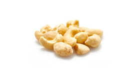 A handful of Yupik raw cashews butts, perfect as a snack or topping.