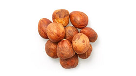 Yupik raw hazelnuts close-up showing creamy texture and crunchy bite.