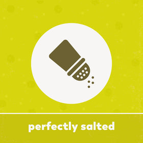 California pistachios in shell on slate board convey premium, gluten-free snacking.